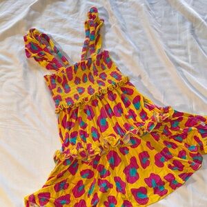 Posh peanut smocked tiered dress